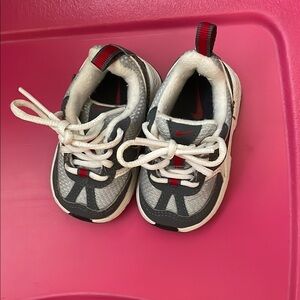 Nike Gray and Red Sneakers with Sporty Design